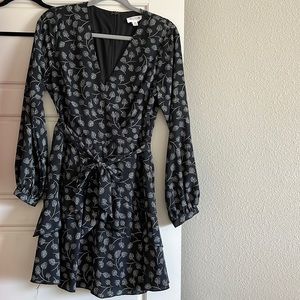 Black dress with flower pattern.